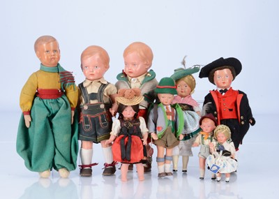 Lot 524 - Nine celluloid dolls in national costumes