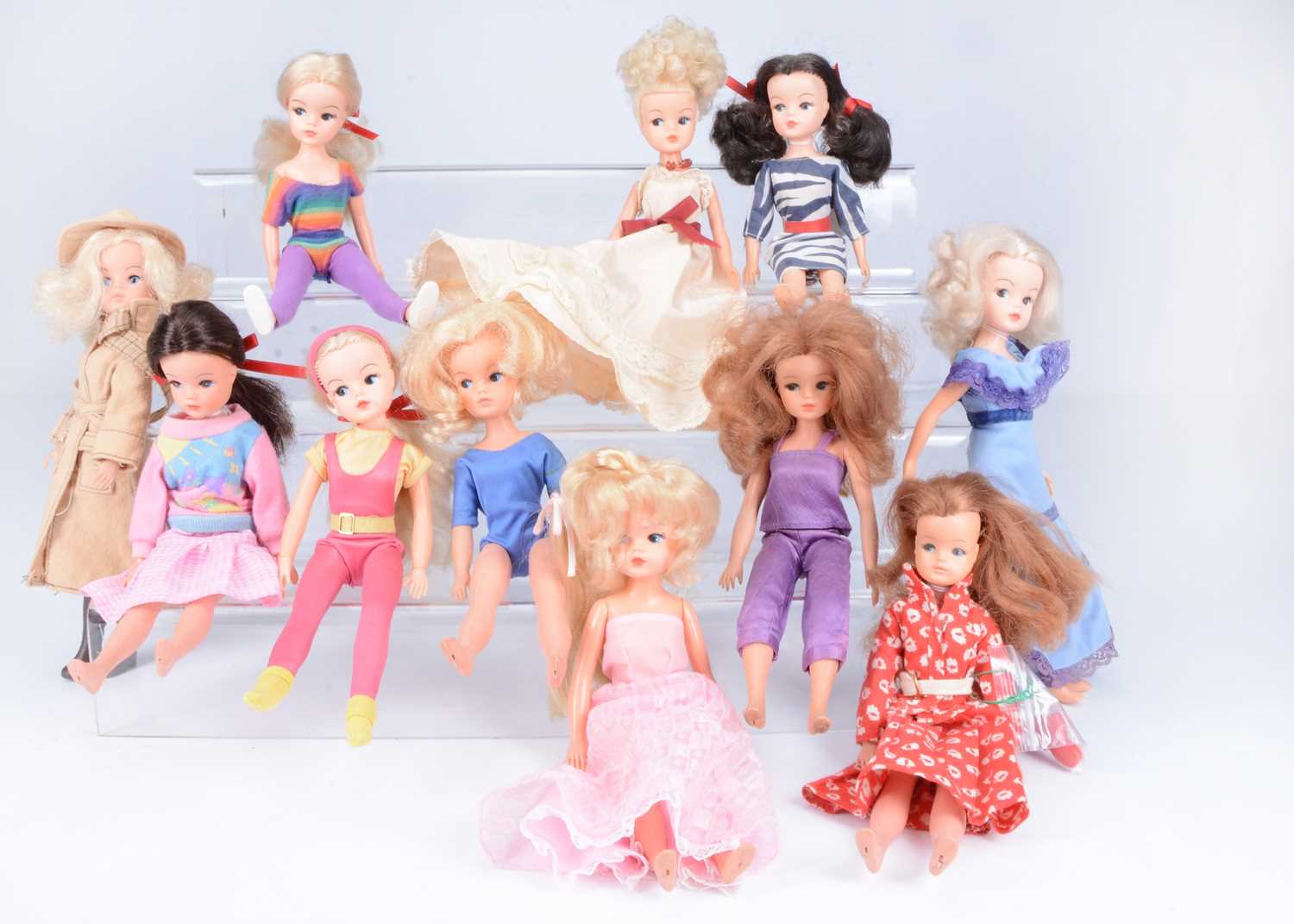 Lot 596 - Eleven Sindy dolls, 1970/80s