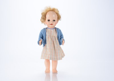 Lot 523 - A 1950s hard plastic walking doll, probably by Pedigree