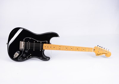 Lot 510 - Squier Stratocaster by Fender/ Fender Combo