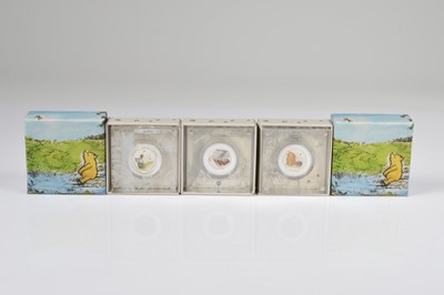 Lot 47 - A set of three Royal Mint modern Winnie The Pooh 1 oz silver proof coins