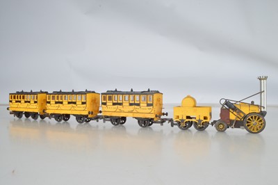 Lot 73 - Tri-ang 00 gauge Rocket locomotive and coaches (5)