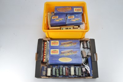 Lot 220 - Hornby-Dublo 00 Gauge boxed and unboxed 3-Rail Passenger Coaches including TPO Sets and Goods Rolling Stock and Station Buildings and Accessories (50+)