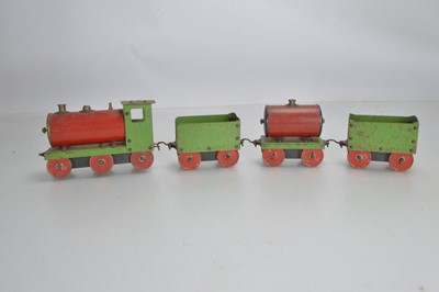 Lot 465 - A Primus or similar loco and wagons metal construction set (4)