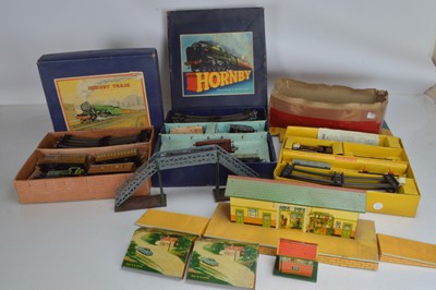 Lot 497 - Three Boxed Hornby Train sets together with a buildings and accessories (4 boxes)