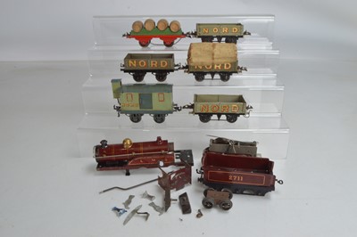 Lot 498 - Hornby O Gauge Nord Rolling stock together with a Barrel Wagon and dismantled clockwork locomotive (7)