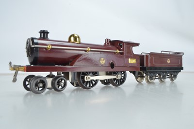 Lot 502 - An early Hornby Nut and Bolt Locomotive and Tender 4-4-0 No 2711 in Maroon with Meccano decal to the locomotive