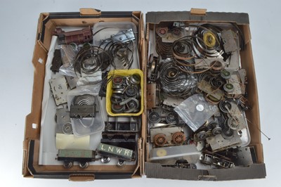Lot 504 - Two boxes containing a large qty of Hornby and similar O gauge spare parts (2 boxes)