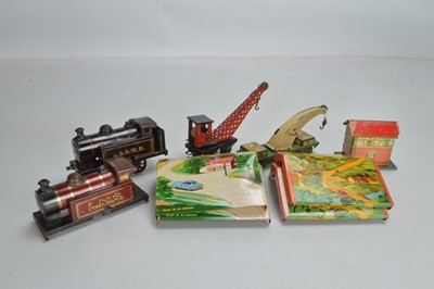 Lot 559 - Nine Brimtoy O Gauge Locomotives, rolling stock and accessories (9)