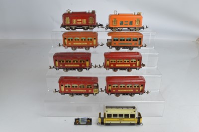 Lot 564 - Lionel O Gauge overhead Electric locomotive together with seven coaches and one further locomotive