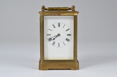 Lot 4 - An Edwardian period brass carriage repeater timepiece