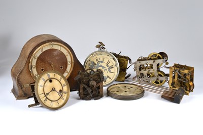 Lot 10 - A collection of clock movements and parts