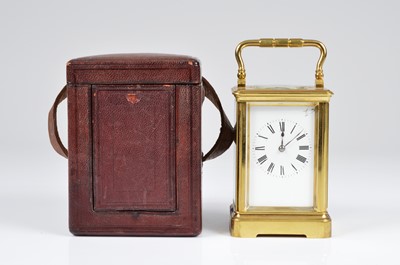 Lot 20 - A cased Edwardian and later brass carriage timepiece