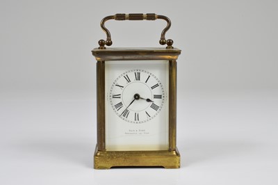 Lot 21 - A vintage brass carriage timepiece from Reid & Sons of Newcastle