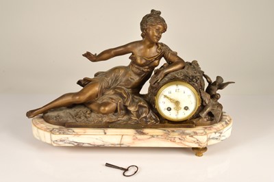Lot 27 - A late 19th century French bronzed spelter and marble mantle clock
