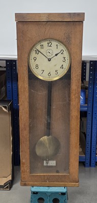 Lot 42 - A c1920s electric wall clock
