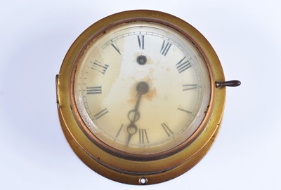 Lot 50 - An early 20th century brass bulk head ships clock