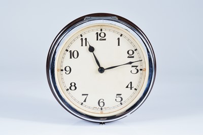 Lot 86 - An Art Deco period bulk head style wall clock