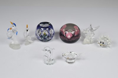 Lot 5 - Two glass paperweights and six Swarovski crystal items