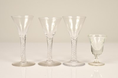 Lot 11 - A set of three drinking glasses and another