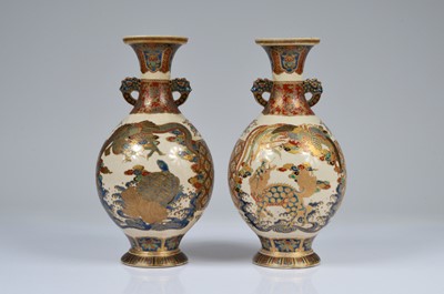 Lot 28 - A pair of early 20th century Japanese Satsuma style earthenware pottery vases