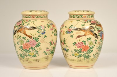 Lot 33 - A pair of mid 20th century satsuma style pottery ginger jars