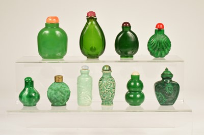 Lot 39 - Ten Chinese green snuff bottles