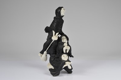 Lot 56 - A second half 20th century Algora porcelain figural group of Laughing Witches