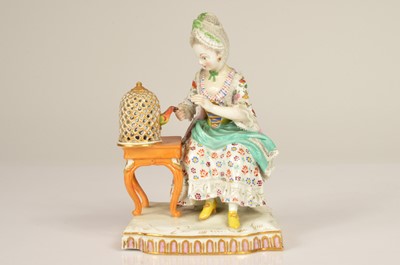 Lot 96 - A 19th century Meissen porcelain figure of a lady and bird