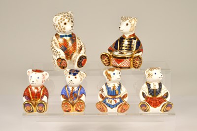 Lot 125 - Six Royal Crown Derby porcelain Teddy Bear paperweight figures