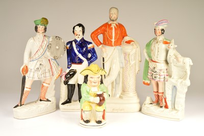 Lot 143 - Four 19th century Staffordshire pottery figures