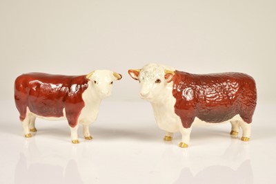 Lot 168 - Two Beswick Pottery cows
