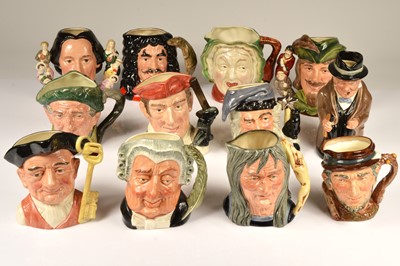 Lot 183 - Eleven Royal Doulton large Toby Jugs