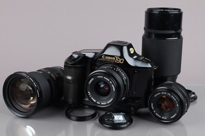 Lot 176 - A Canon T90 SLR Camera Outfit