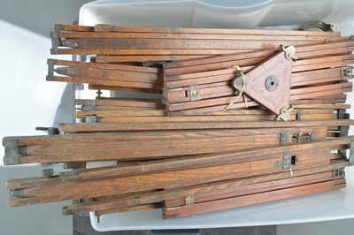 Lot 84 - Four Mahogany & Brass Tripods