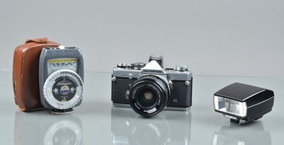 Lot 249 - An Olympus OM-2n SLR Camera