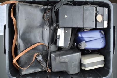 Lot 492 - A Crate of Polaroid Cameras