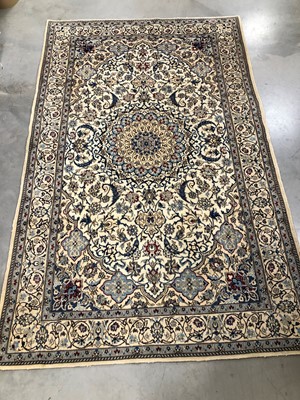 Lot 1 - A Persian woollen rug