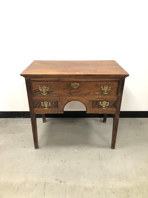 Lot 50 - A small early 19th century oak low boy