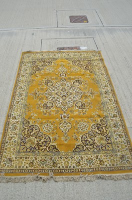 Lot 74 - A 20th century wool on cotton rug