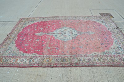 Lot 75 - A large middle eastern woollen rug