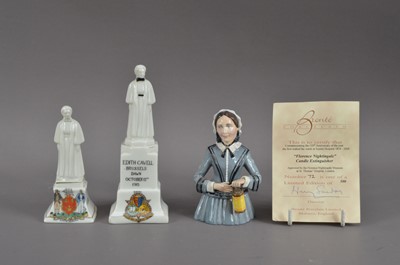 Lot 104 - A Bronte porcelain candle snuffer in the form of Florence Nightingale