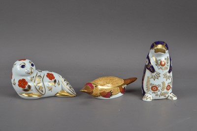 Lot 124 - Three Royal Crown Derby bone china paperweights