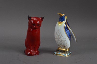 Lot 173 - A Royal Doulton flambe cat