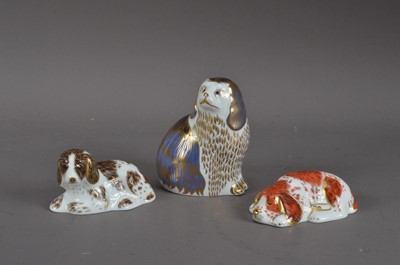 Lot 176 - Three dog Royal Crown Derby bone china paperweights