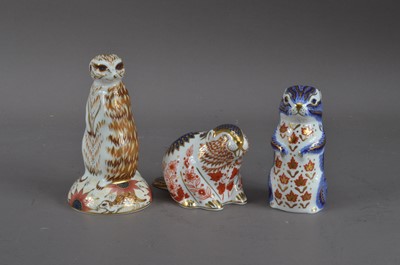 Lot 181 - Three Royal Crown Derby bone china paperweights
