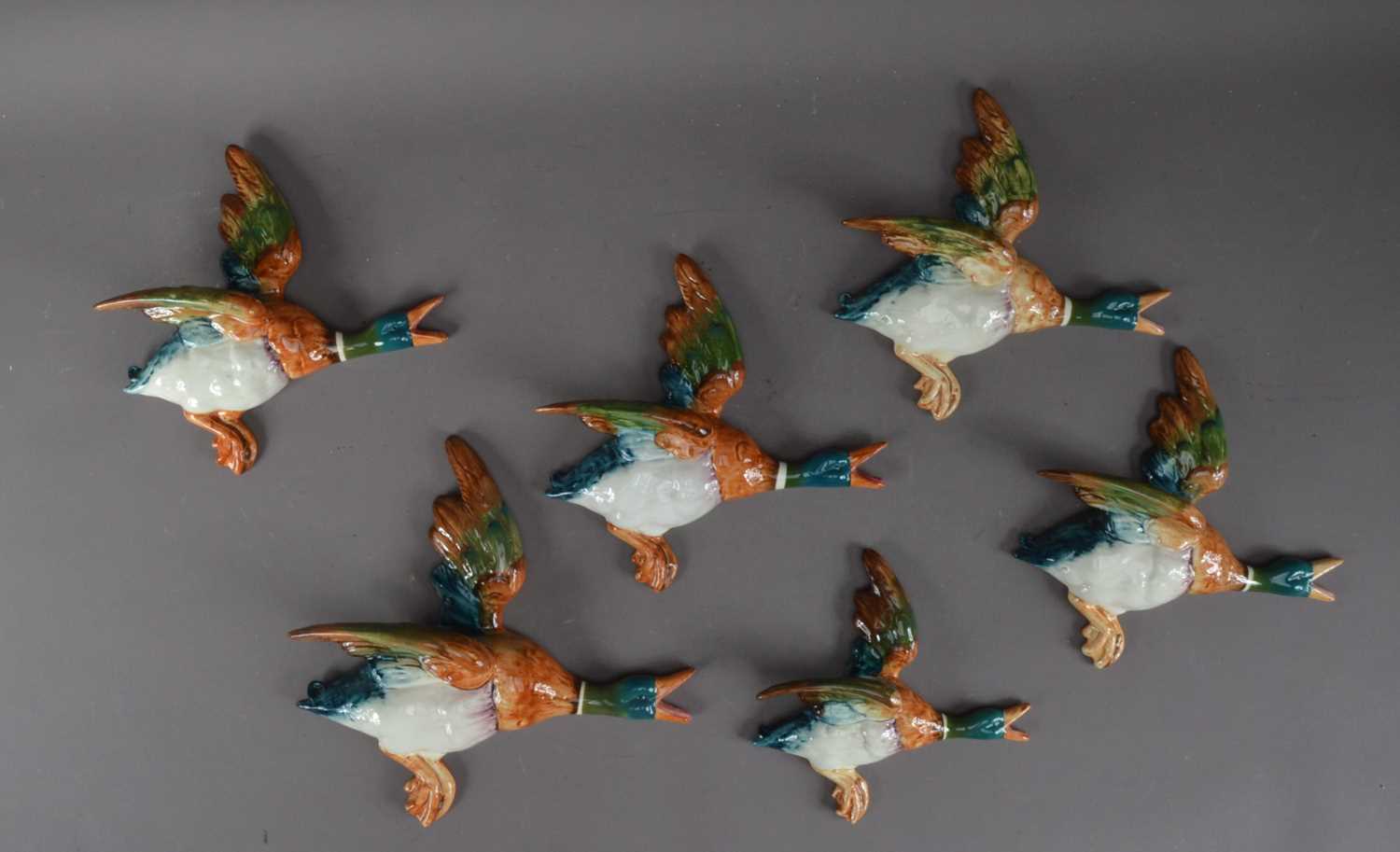 Lot 206 - A collection of ceramic graduated Beswick wall mounted ducks