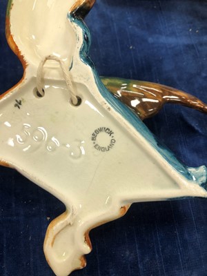 Lot 206 - A collection of ceramic graduated Beswick wall mounted ducks