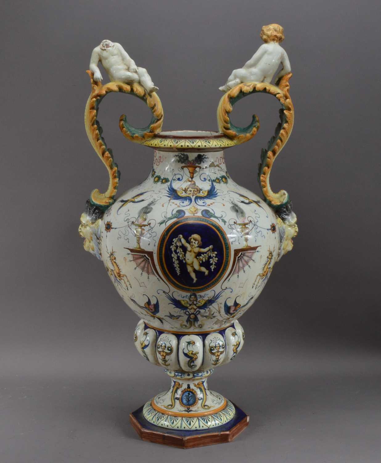 Lot 213 - A large and damaged early 20th century continental faience large urn
