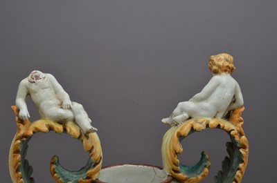Lot 213 - A large and damaged early 20th century continental faience large urn